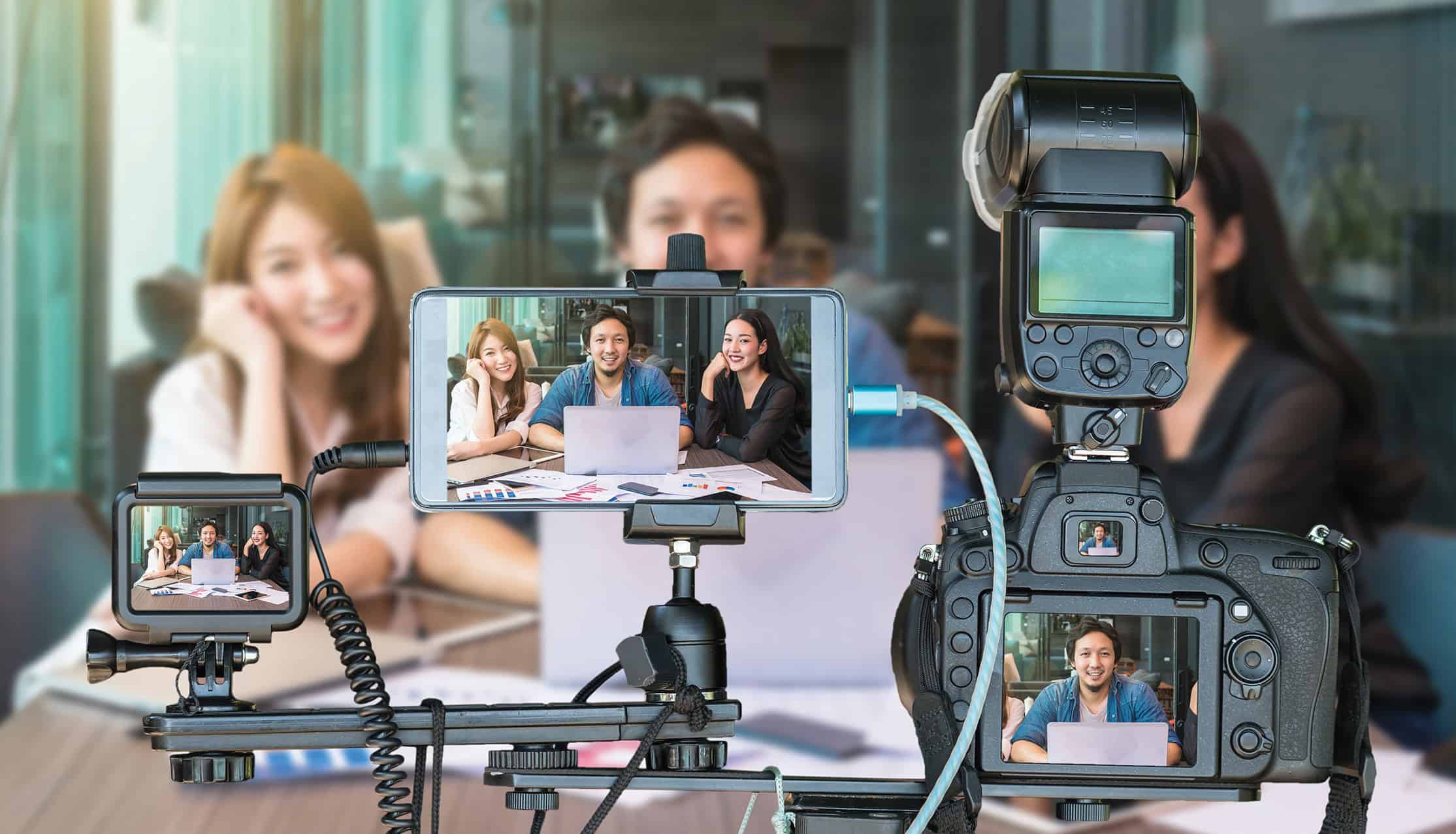 CT Gold @ Macpherson | Freehold B1 Industrial Professional set of camera with smart mobile phone and action camera on tripod over Group Of AsianBusiness people giving the interview via Live stream, Live Streaming for entrepreneur concept